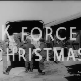 Army truck behind words 'K-Force Christmas'