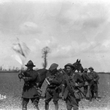 New Zealand troops signalling with flag