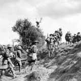 Canadian soldiers move toward the front