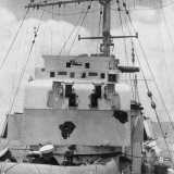Shrapnel damage to director control tower