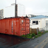 Shipping container storage shed