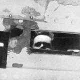Damage to director control tower plating