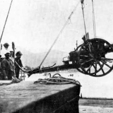 Arrival of presentation gun, Cook Islands