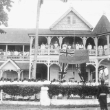 Raising the New Zealand flag in Apia, 1930s
