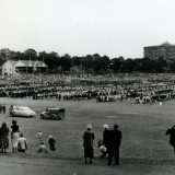 Children greeting the Queen at Auckland Domain, 1953