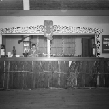 Māori carver at Centennial Exhibition