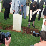 Helen Clark planting rose at Crete, 2001