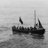 Rescuing survivors from torpedoed merchant ship
