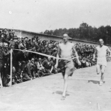 POW crossing finish line of race