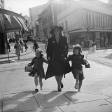 Woman on street on VE Day