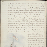 Māori beneath United Tribes flag