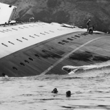 Divers inspecting the sunken <em>Wahine</em>