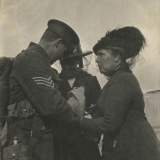 A mother farewells her soldier son