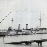 HMS <em>Philomel</em> dressed to celebrate a royal wedding
