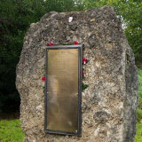 View brass plaque with list of names inlaid into a piece of rock