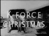 Army truck behind words 'K-Force Christmas'
