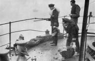 Inspecting bomb damage on ship
