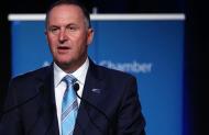 John Key wearing Silver Fern flag pin