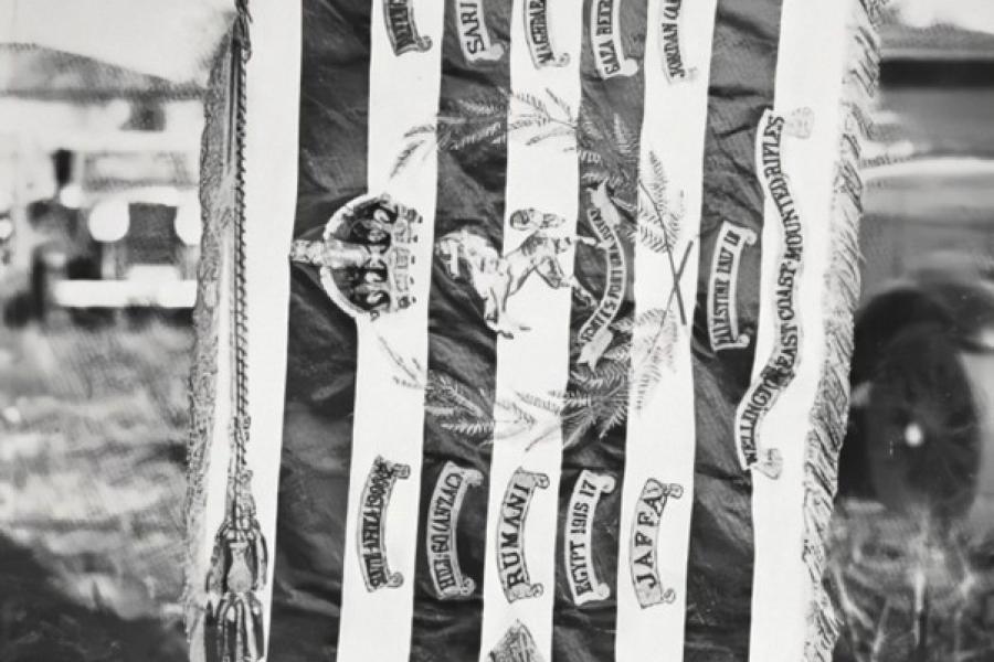 Flag featuring the names of military unit and First World War battlefields