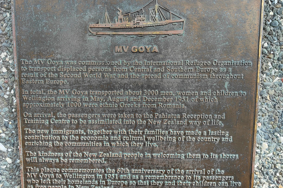 Commemorative plaque with outline of ship above lines of text