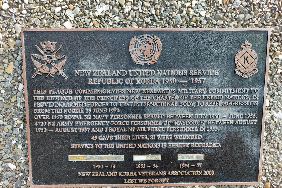 Commemorative plaque attached to wall