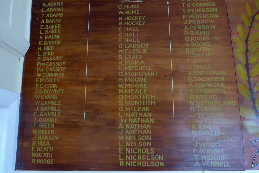 Detail of wooden plaque with list of names in gold lettering