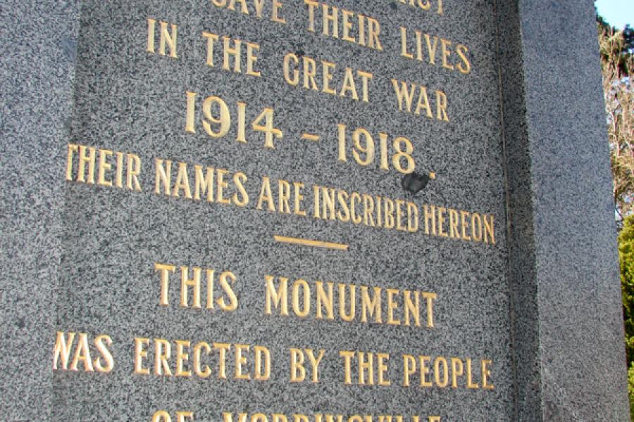 Words inscribed on stone in gold lettering