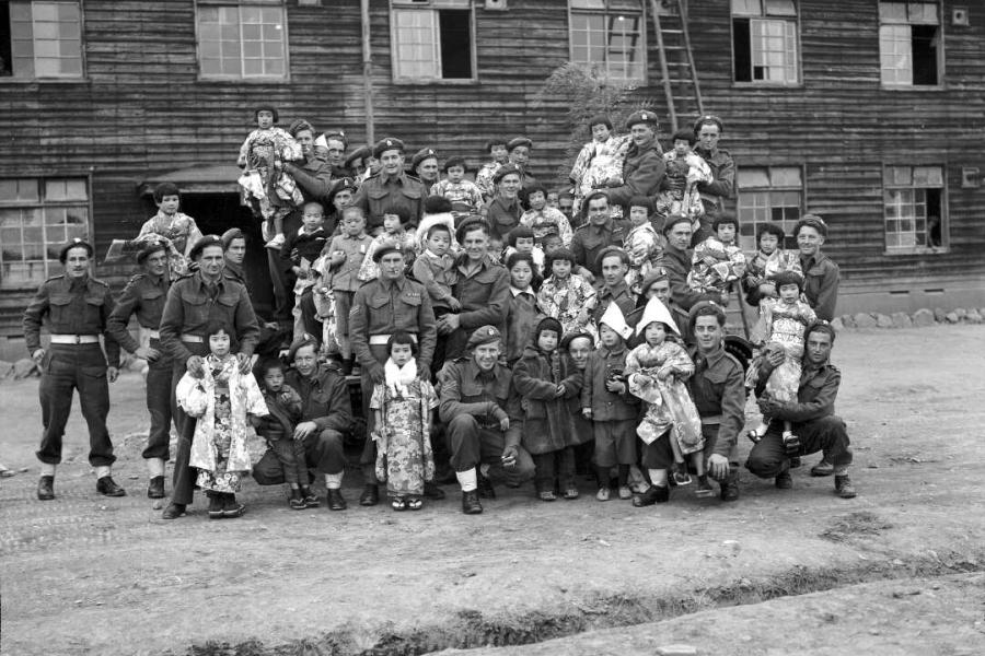 New Zealand J-Force soldiers hosting a Christmas party for Japanese children, Chofu, Japan, between 1946 and 1948.