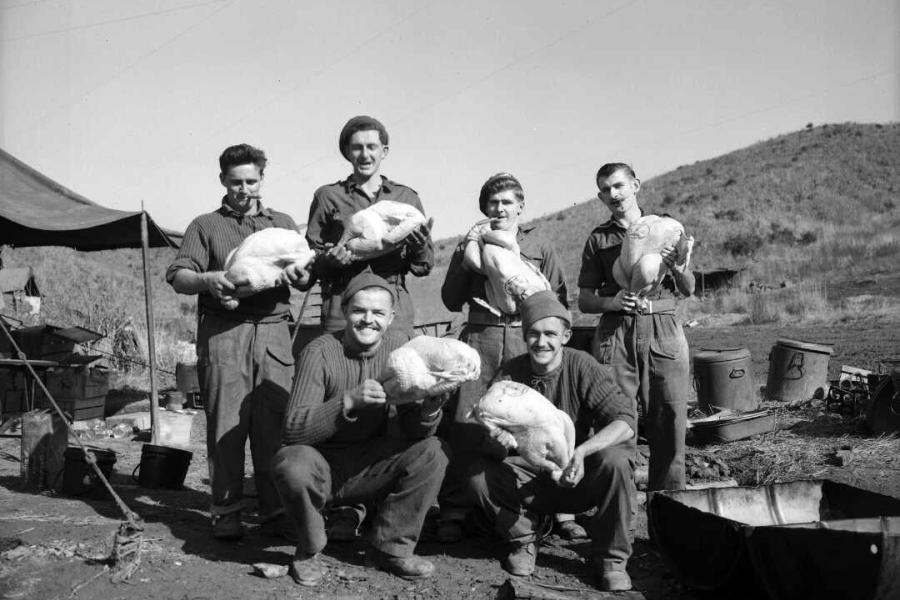 Cooks of the 162 Battery pose with turkeys, Christmas dinner, Korea, 1951.