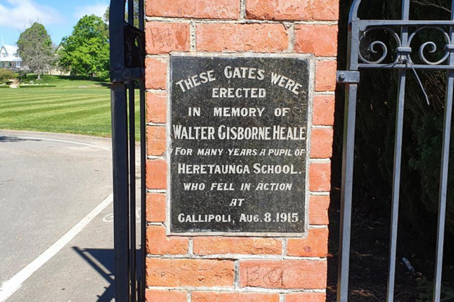 View of brick and wrought-iron gates at the entrance of Hereworth School grounds. Includes plaque to former pupil Walter Gisborne Heale who was killed at Gallipoli during the First World War.