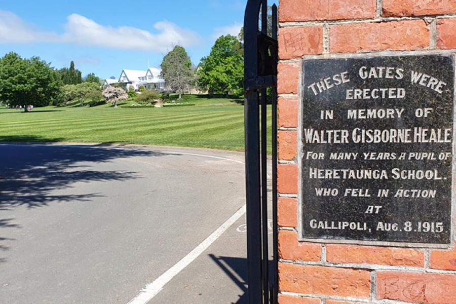 View of brick and wrought-iron gates at the entrance of Hereworth School grounds. Includes plaque to former pupil Walter Gisborne Heale who was killed at Gallipoli during the First World War.