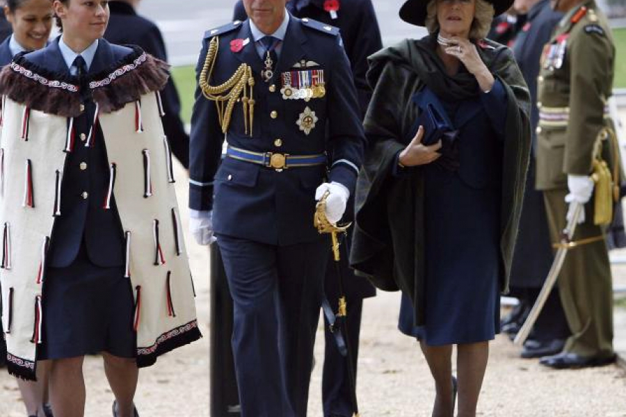 Group of men and women, some wearing military uniforms and medals