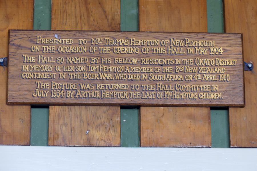 Wooden board with gold lettering