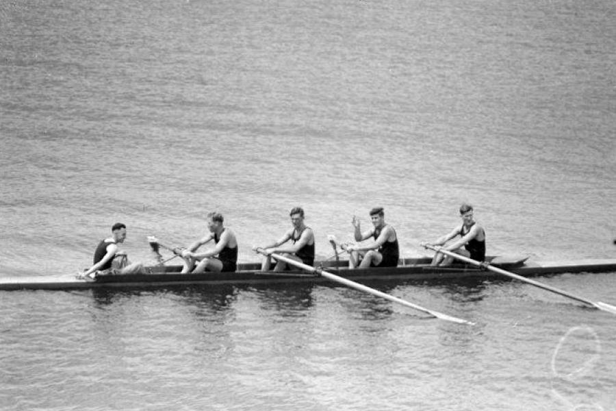 The New Zealand coxed fours celebrate their victory.