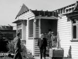 Walter Nash visits a tornado-damaged house in Frankton