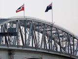 Tino Rangatiratanga flag flying on Auckland Harbour Bridge