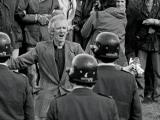 Reverend George Armstrong addresses police
