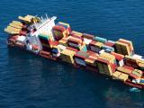 The container ship Rena grounded on Astrolabe Reef
