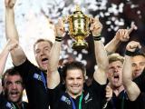  Richie McCaw lifts the Webb Ellis Cup