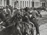 Unionists stand their ground as mounted special constables prepare to charge them