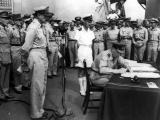 Isitt signing the Japanese surrender treaty on board the USS Missouri
