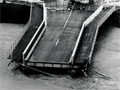 Broken bridge and flooded river
