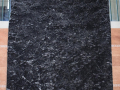 Detail of soil, grass and leaves in black and white