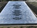 Granite tablet with words engraved on it