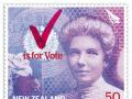 Stamp feature large red tick is for vote featuring head and shoulders picture of a woman
