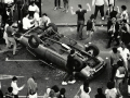 Concertgoers overturn a car during the Queen St riot, 1984