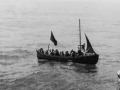 Rescuing survivors from torpedoed merchant ship