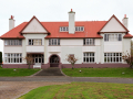 Large house with red tiled roof