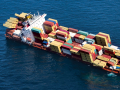The container ship Rena grounded on Astrolabe Reef