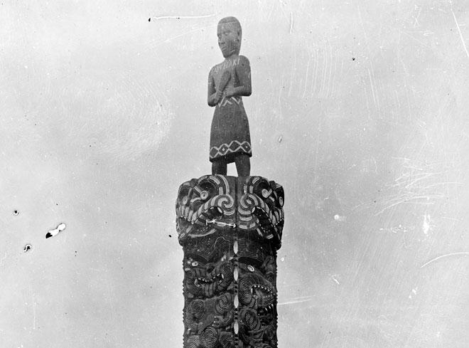 Carved wooden Māori figure